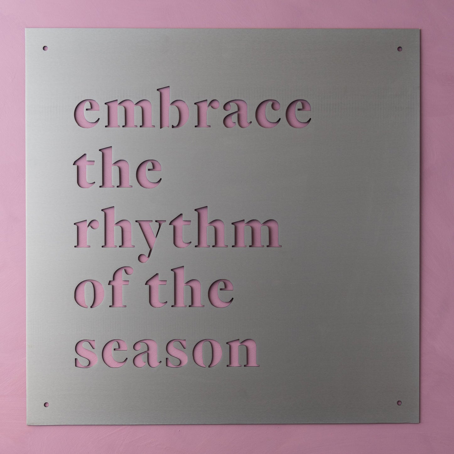 metal wall sign that reads "embrace the rhythm of the season"